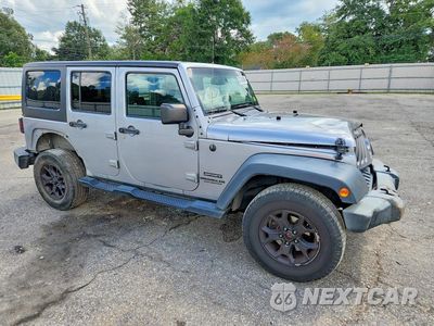 Czwarte zdjęcie samochodu z boku: 2016 JEEP WRANGLER UNLIMITED SPORT VIN:1C4BJWDG4GL169902 - miniatura