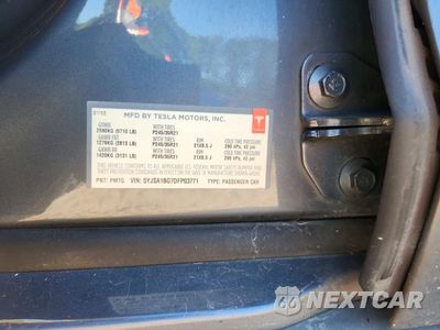 Zdjęcie 12 z 12 samochodu: 2013 TESLA MODEL S VIN:5YJSA1BG7DFP03771 - miniatura