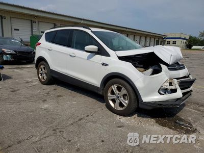 Czwarte zdjęcie samochodu z boku: 2016 FORD ESCAPE SE VIN:1FMCU0GX5GUB13395 - miniatura