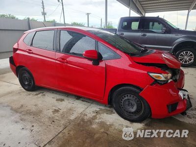 Czwarte zdjęcie samochodu z boku: 2016 HONDA FIT LX VIN:JHMGK5H51GX022109 - miniatura