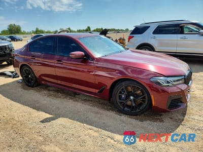 Czwarte zdjęcie samochodu z boku: 2022 BMW M550XI VIN:WBA13BK0XNCH85198 - miniatura