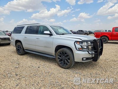 Czwarte zdjęcie samochodu z boku: 2019 CHEVROLET SUBURBAN K1500 LT VIN:1GNSKHKC0KR358147 - miniatura