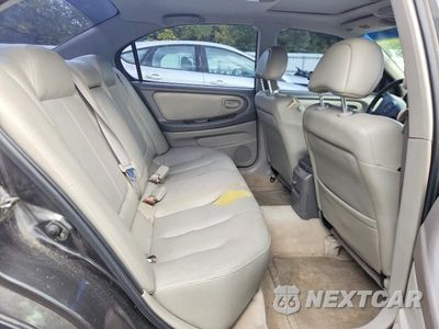 Zdjęcie 10 z 13 samochodu: 2001 NISSAN MAXIMA GXE VIN:JN1CA31A61T113215 - miniatura