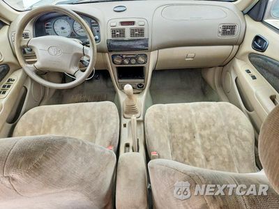Zdjęcie 8 z 12 samochodu: 2000 TOYOTA COROLLA VE VIN:1NXBR18E7YZ315561 - miniatura