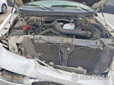 Zdjęcie 11 z 12 samochodu: 2004 FORD F150 VIN:1FTPX12504NA54805 - miniatura