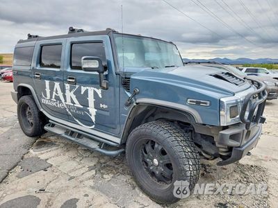 Czwarte zdjęcie samochodu z boku: 2006 HUMMER H2 VIN:5GRGN23U86H114069 - miniatura