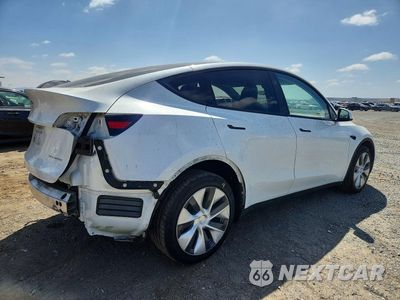 Trzecie zdjęcie samochodu z tyłu: 2023 TESLA MODEL Y VIN:7SAYGDEE3PA188132 - miniatura