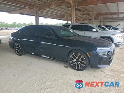 Czwarte zdjęcie samochodu z boku: 2023 BMW 760 XI VIN:WBA33EJ0XPCM28471 - miniatura
