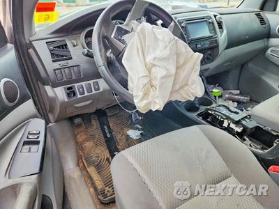 Zdjęcie 8 z 13 samochodu: 2014 TOYOTA TACOMA V6 VIN:5TFUU4EN1EX097970 - miniatura