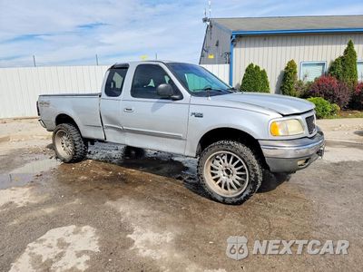 Czwarte zdjęcie samochodu z boku: 2003 FORD F150 VIN:2FTRX18L03CA26344 - miniatura