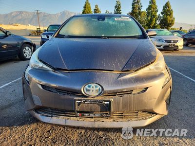 Piąte zdjęcie samochodu w środku: 2017 TOYOTA PRIUS TWO VIN:JTDKBRFU5H3540715 - miniatura