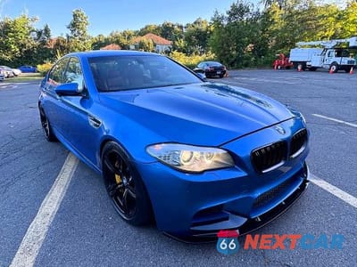 Czwarte zdjęcie samochodu z boku: 2013 BMW M5 VIN:WBSFV9C50DD096758 - miniatura