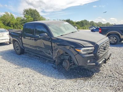 Czwarte zdjęcie samochodu z boku: 2023 TOYOTA TACOMA TRD OFF-ROAD VIN:3TMCZ5AN1PM576617 - miniatura