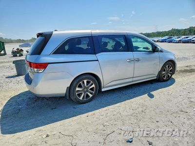Trzecie zdjęcie samochodu z tyłu: 2014 HONDA ODYSSEY TOURING VIN:5FNRL5H92EB100978 - miniatura