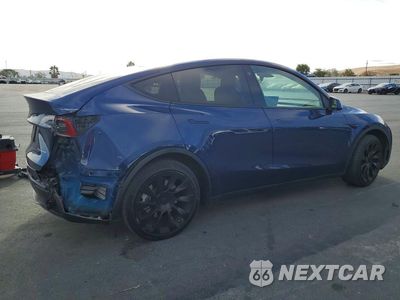 Trzecie zdjęcie samochodu z tyłu: 2023 TESLA MODEL Y VIN:7SAYGAEE9PF583319 - miniatura
