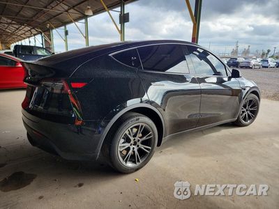 Trzecie zdjęcie samochodu z tyłu: 2024 TESLA MODEL Y VIN:7SAYGDEE9RA294393 - miniatura