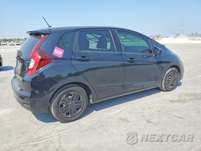 Trzecie zdjęcie samochodu z tyłu: 2020 HONDA FIT LX VIN:3HGGK5H43LM710543 - miniatura