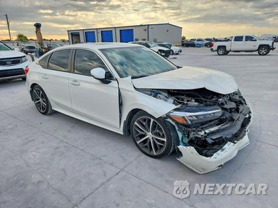 Czwarte zdjęcie samochodu z boku: 2024 HONDA CIVIC TOURING VIN:2HGFE1F93RH317188 - miniatura