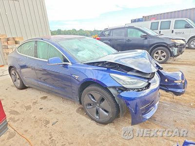 Czwarte zdjęcie samochodu z boku: 2018 TESLA MODEL 3 VIN:5YJ3E1EA9JF034222 - miniatura