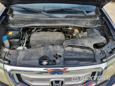 Zdjęcie 12 z 13 samochodu: 2011 HONDA PILOT EX VIN:5FNYF4H46BB073281 - miniatura