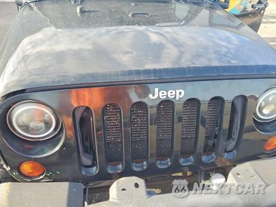 Zdjęcie 11 z 12 samochodu: 2012 JEEP WRANGLER UNLIMITED SPORT VIN:1C4HJWDGXCL182223 - miniatura
