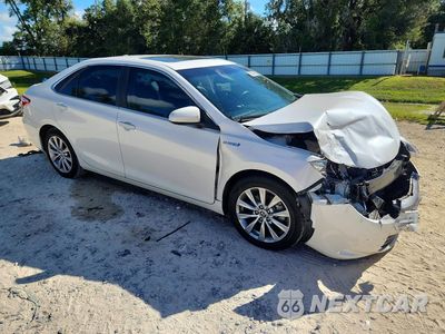 Czwarte zdjęcie samochodu z boku: 2016 TOYOTA CAMRY HYBRID XLE VIN:4T1BD1FK5GU179808 - miniatura