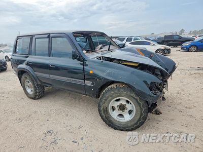 Czwarte zdjęcie samochodu z boku: 1996 TOYOTA LAND CRUISER HJ VIN:JT111TJ8207404720 - miniatura