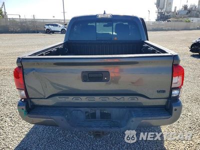 Zdjęcie 6 z 13 samochodu: 2019 TOYOTA TACOMA TRD SPORT VIN:3TMAZ5CNXKM111010 - miniatura