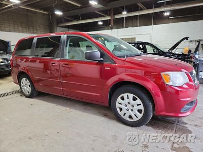 Czwarte zdjęcie samochodu z boku: 2014 DODGE GRAND CARAVAN SE VIN:2C4RDGBGXER411143 - miniatura
