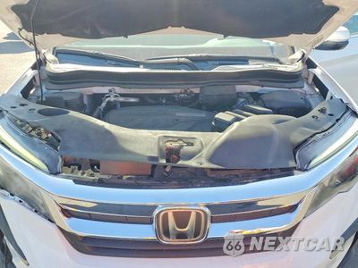 Zdjęcie 12 z 13 samochodu: 2020 HONDA PILOT EX VIN:5FNYF5H36LB011135 - miniatura