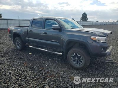 Czwarte zdjęcie samochodu z boku: 2017 TOYOTA TACOMA SR5 V6 VIN:3TMDZ5BN3HM036142 - miniatura
