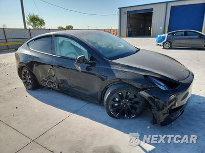 Czwarte zdjęcie samochodu z boku: 2021 TESLA MODEL Y VIN:5YJYGDEE0MF198628 - miniatura