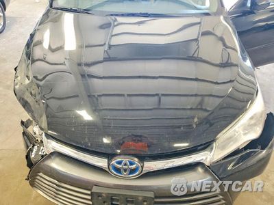 Zdjęcie 11 z 12 samochodu: 2016 TOYOTA CAMRY HYBRID XLE VIN:4T1BD1FK2HU221000 - miniatura