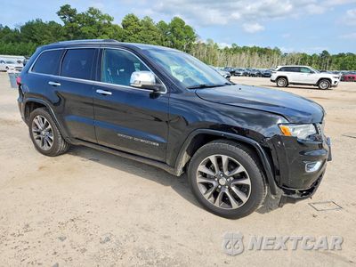 Czwarte zdjęcie samochodu z boku: 2017 JEEP GRAND CHEROKEE OVERLAND VIN:1C4RJFCGXHC843195 - miniatura