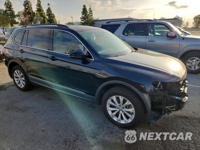 Czwarte zdjęcie samochodu z boku: 2018 VOLKSWAGEN TIGUAN SE VIN:3VV3B7AX5JM175839 - miniatura