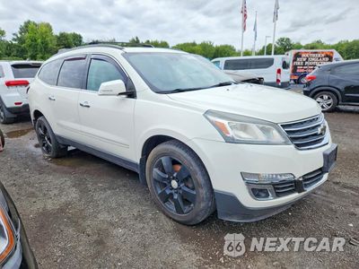 Czwarte zdjęcie samochodu z boku: 2015 CHEVROLET TRAVERSE LTZ VIN:1GNKVJKDXFJ171302 - miniatura