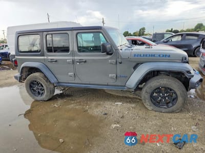 Czwarte zdjęcie samochodu z boku: 2023 JEEP WRANGLER 4XE VIN:1C4JJXN67PW628555 - miniatura