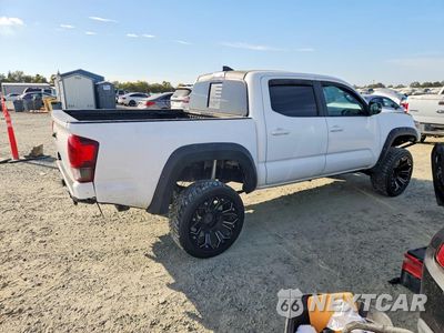 Trzecie zdjęcie samochodu z tyłu: 2018 TOYOTA TACOMA TRD SPORT VIN:3TMCZ5AN3JM157840 - miniatura