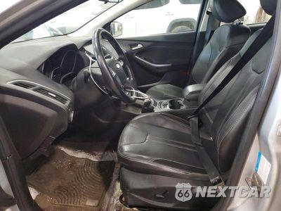 Zdjęcie 7 z 12 samochodu: 2014 FORD FOCUS TITANIUM VIN:1FADP3N28EL257251 - miniatura