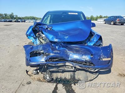 Piąte zdjęcie samochodu w środku: 2023 TESLA MODEL Y VIN:7SAYGAEE0PF703654 - miniatura