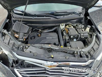 Zdjęcie 12 z 13 samochodu: 2018 CHEVROLET EQUINOX PREMIER VIN:3GNAXVEV8JS582027 - miniatura