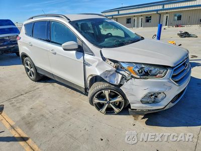 Czwarte zdjęcie samochodu z boku: 2017 FORD ESCAPE SE VIN:1FMCU0G99HUA78749 - miniatura