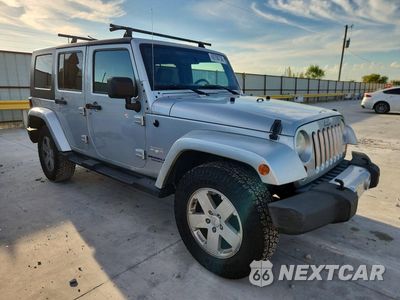 Czwarte zdjęcie samochodu z boku: 2008 JEEP WRANGLER UNLIMITED SAHARA VIN:1J4GA59138L505507 - miniatura