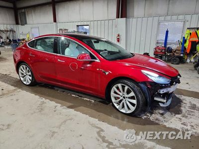 Czwarte zdjęcie samochodu z boku: 2018 TESLA MODEL 3 VIN:5YJ3E1EB2JF011325 - miniatura