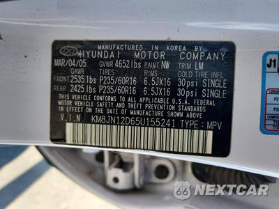 Zdjęcie 13 z 13 samochodu: 2005 HYUNDAI TUCSON VIN:KM8JN12D65U155241 - miniatura