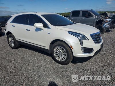 Czwarte zdjęcie samochodu z boku: 2019 CADILLAC XT5 VIN:1GYKNBRS7KZ138718 - miniatura
