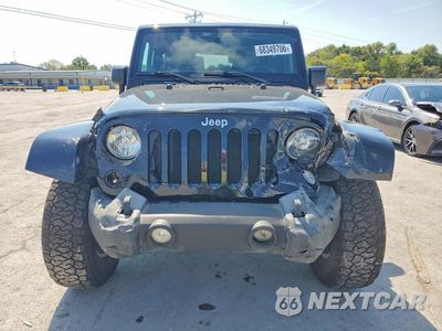 Piąte zdjęcie samochodu w środku: 2015 JEEP WRANGLER SAHARA VIN:1C4AJWBG9FL649253 - miniatura