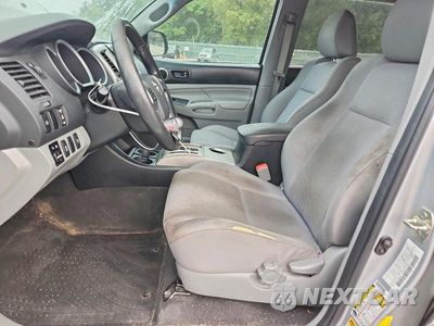 Zdjęcie 7 z 12 samochodu: 2013 TOYOTA TACOMA V6 VIN:3TMLU4EN4DM105804 - miniatura