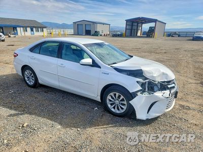 Czwarte zdjęcie samochodu z boku: 2016 TOYOTA CAMRY HYBRID LE VIN:4T1BD1FK9GU186244 - miniatura
