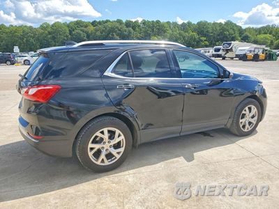 Trzecie zdjęcie samochodu z tyłu: 2018 CHEVROLET EQUINOX PREMIER VIN:2GNAXVEV1J6321692 - miniatura